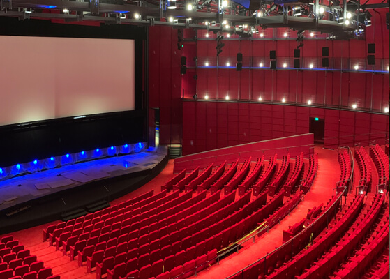 Aerial view of an empty theatre showing red seating